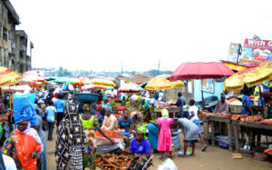 Nigerian market place with color umbrellas