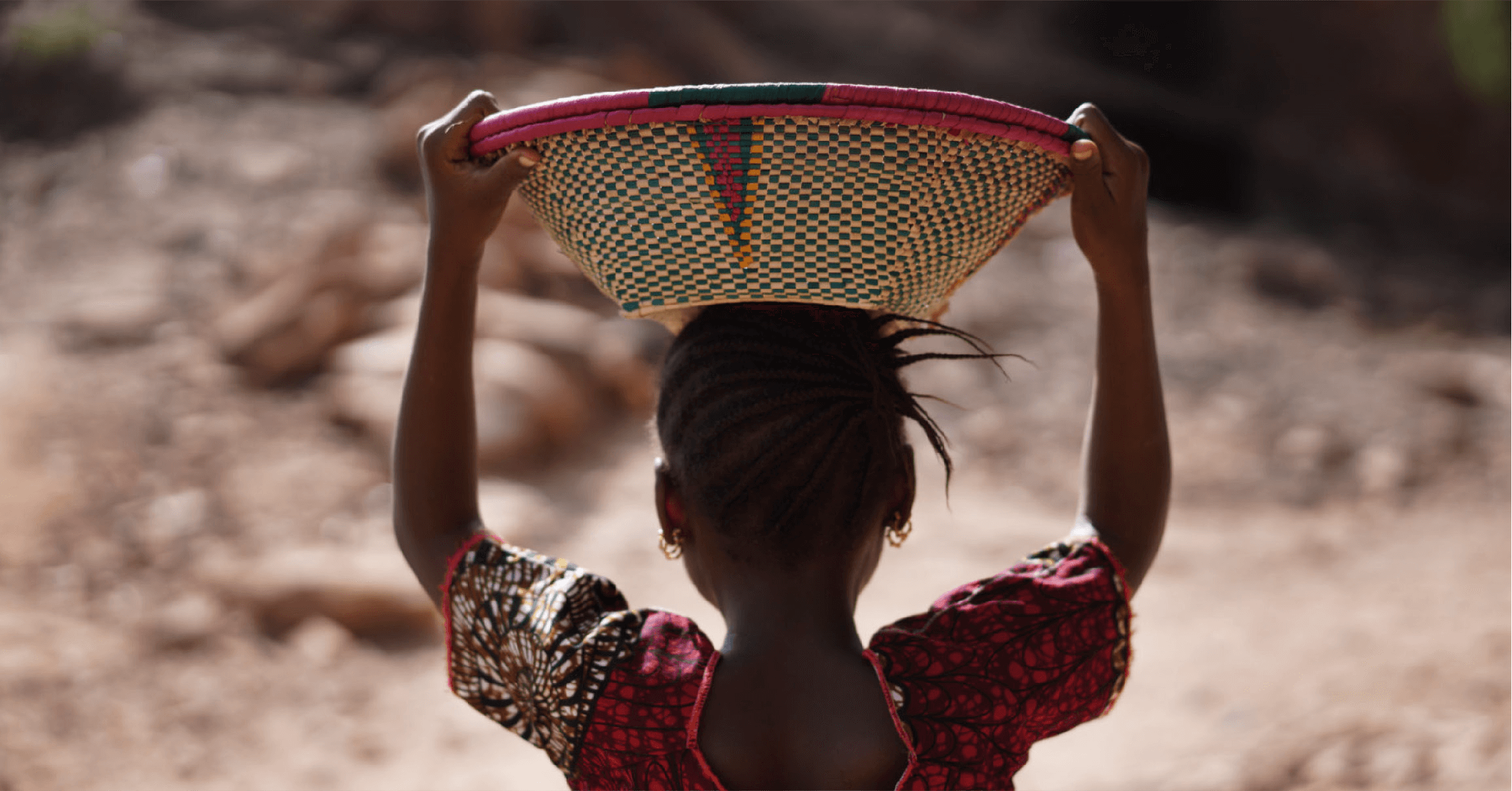 African Girl Carrying Bowl On Her Head