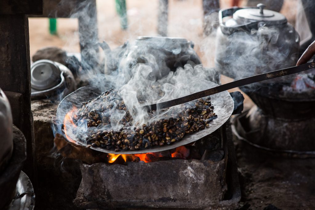Ethiopian coffee roasting in traditional cook method.