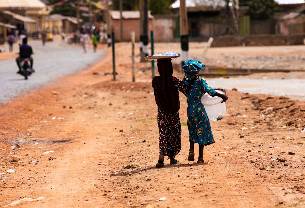 Girls Near Road in Africa